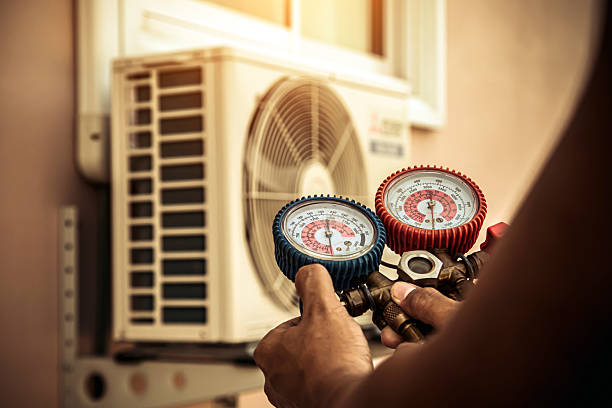 Professional Air Conditioning Service technician working in Samantha, AL